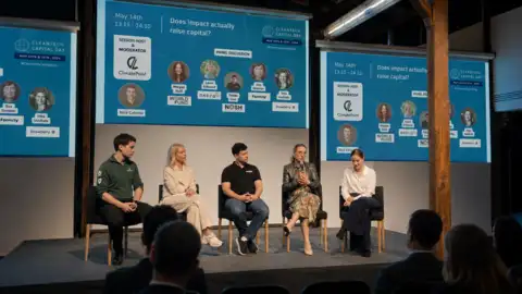 Nick Catania moderating a Cleantech Scandinavia panel in Helsinki with food-tech, impact finance, and hospitality professionals on stage.